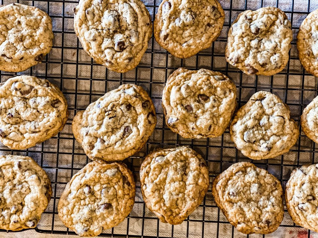 chocolate chip cookies on a drying rack