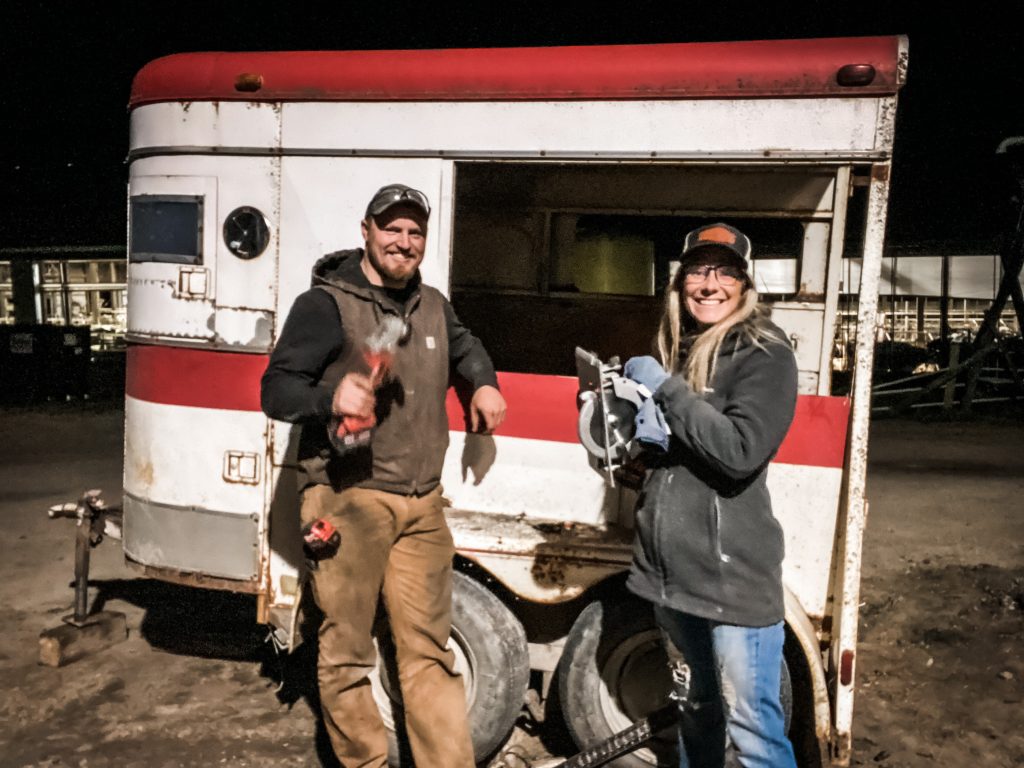 My working partner Mitch and I standing near the trailer