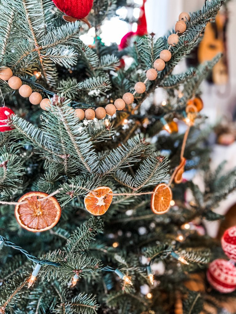 orange garland on the Christmas tree