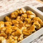 cinnamon rolls in a white pyrex pan