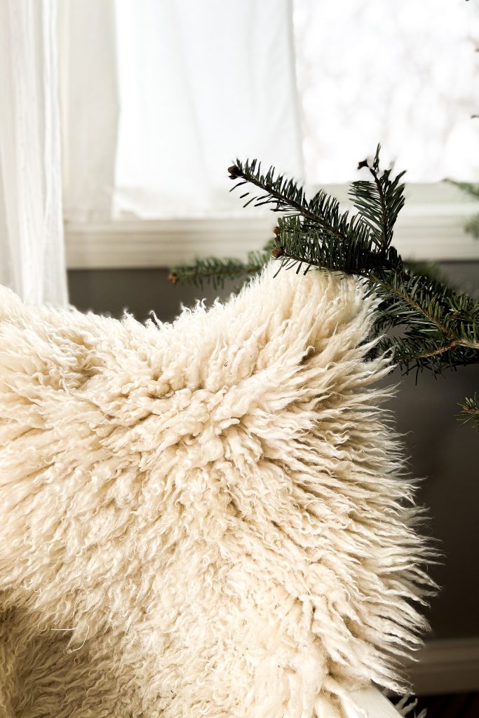 sheepskin on a rocking chair by the Christmas tree