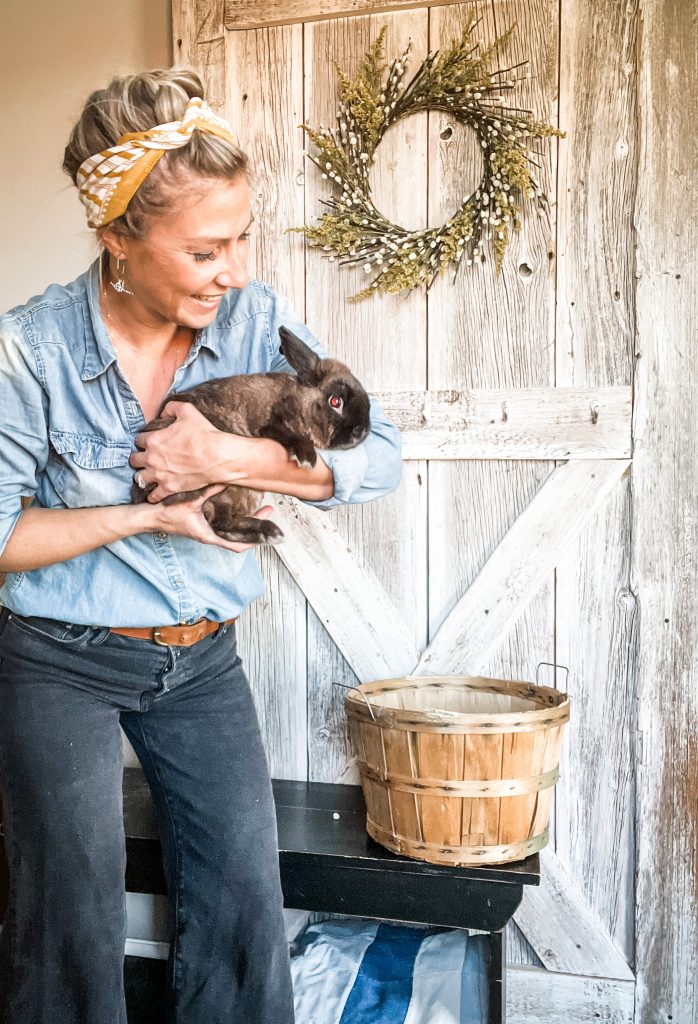 Holding Otis near our new spring wreath