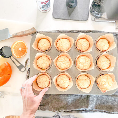 flay lay of homemade orange muffins