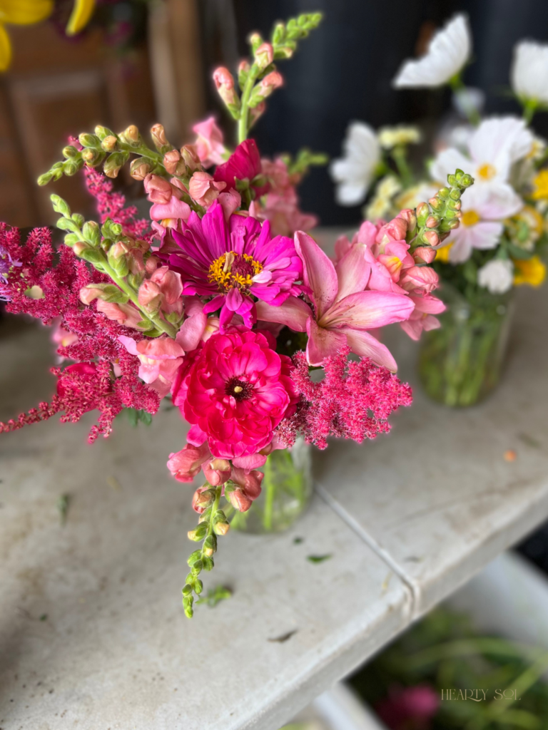 flowers in jar on table