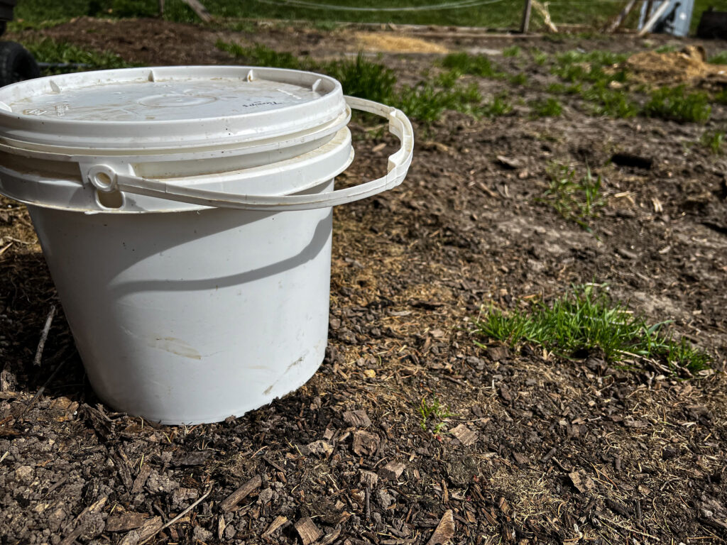 empty bucket with lid
