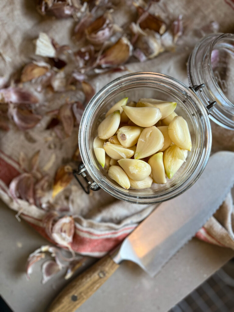 raw garlic in a jar