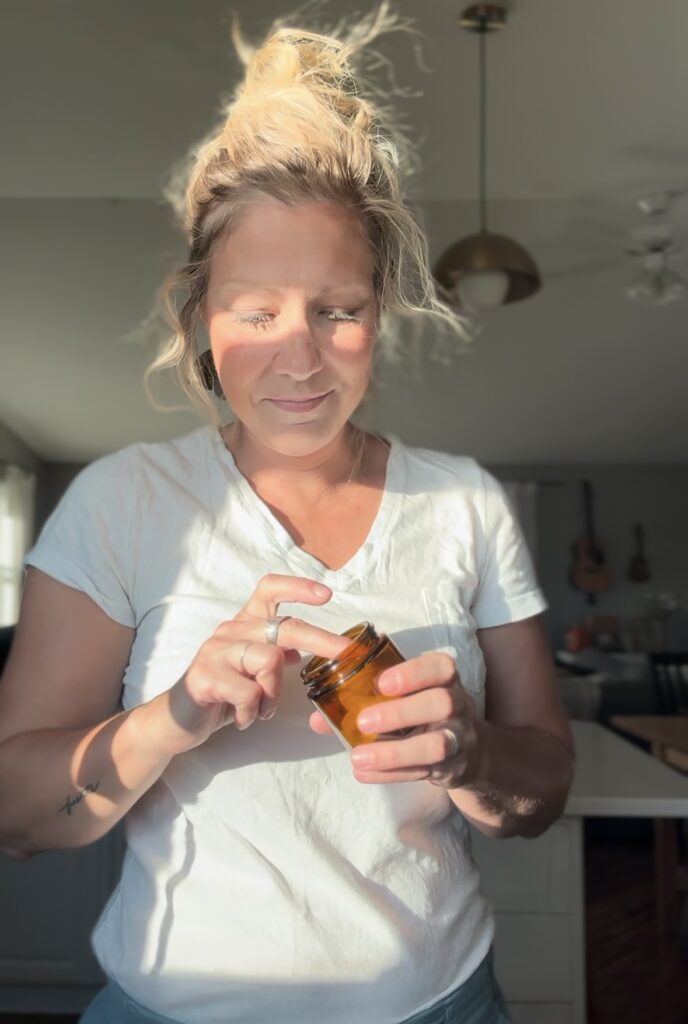 holding a tallow in a jar