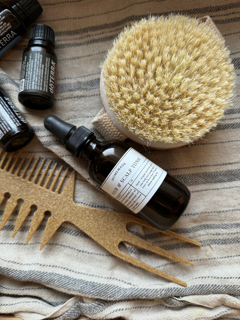 diy hair tonic in amber bottle