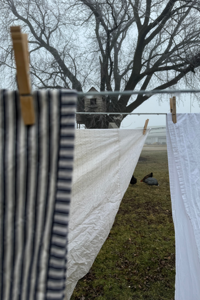Hanging Sheets on a clothesline