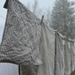 Hanging Sheets on a clothesline