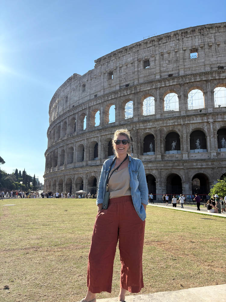 Standing in front of Colosseum