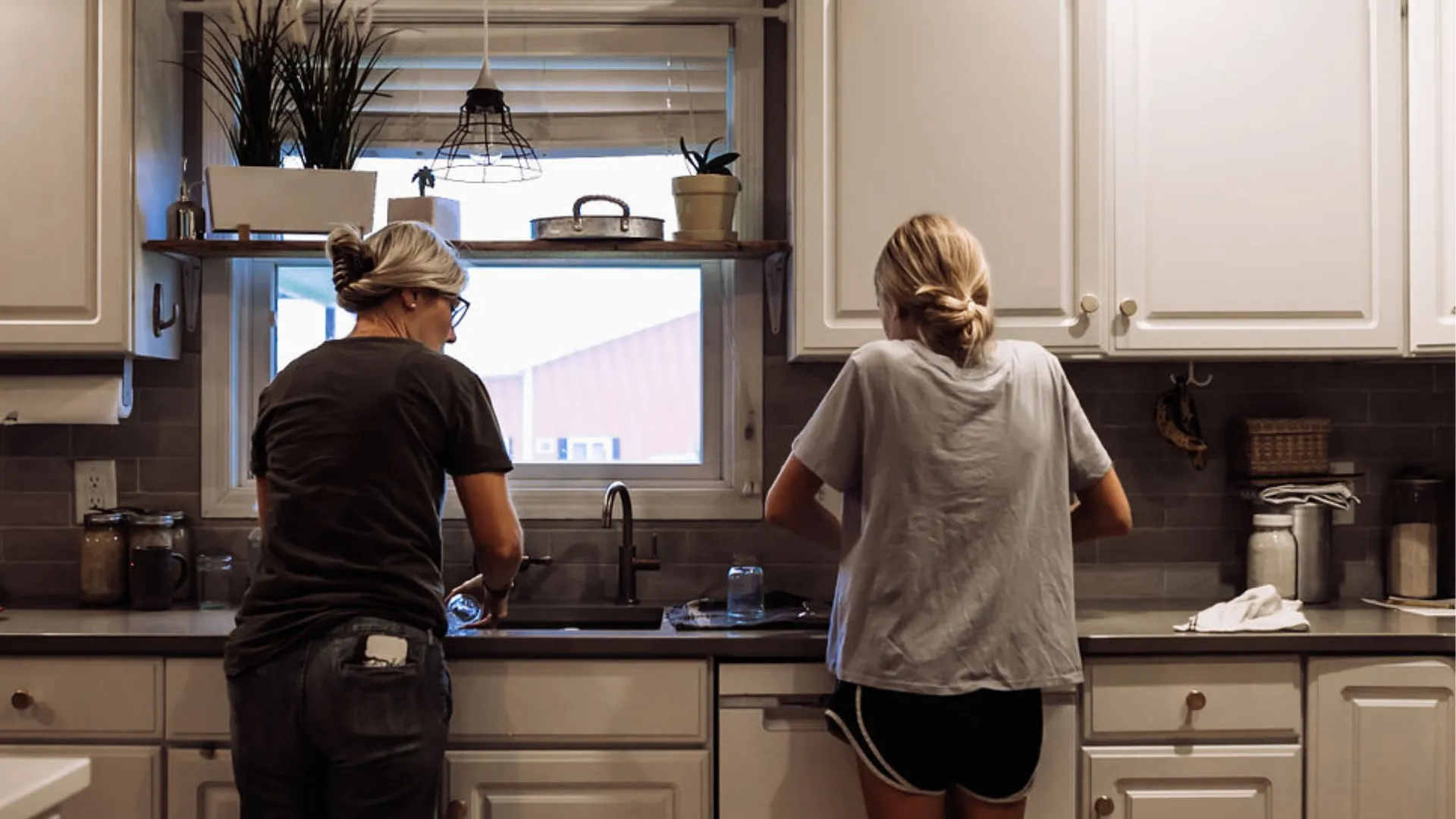Mother and daughter in kitchen